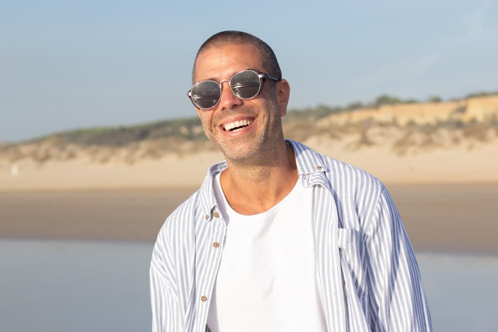 When can I go on holiday or in the sun following a hair transplant?